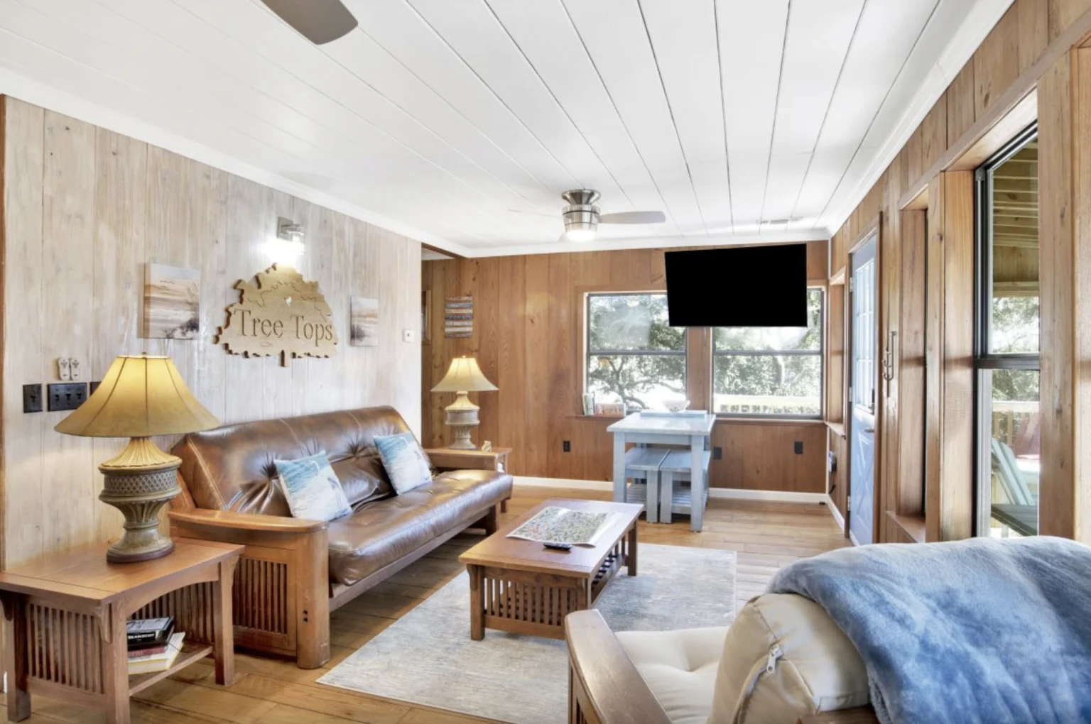 Living room with TV and dining nook, Tree Tops