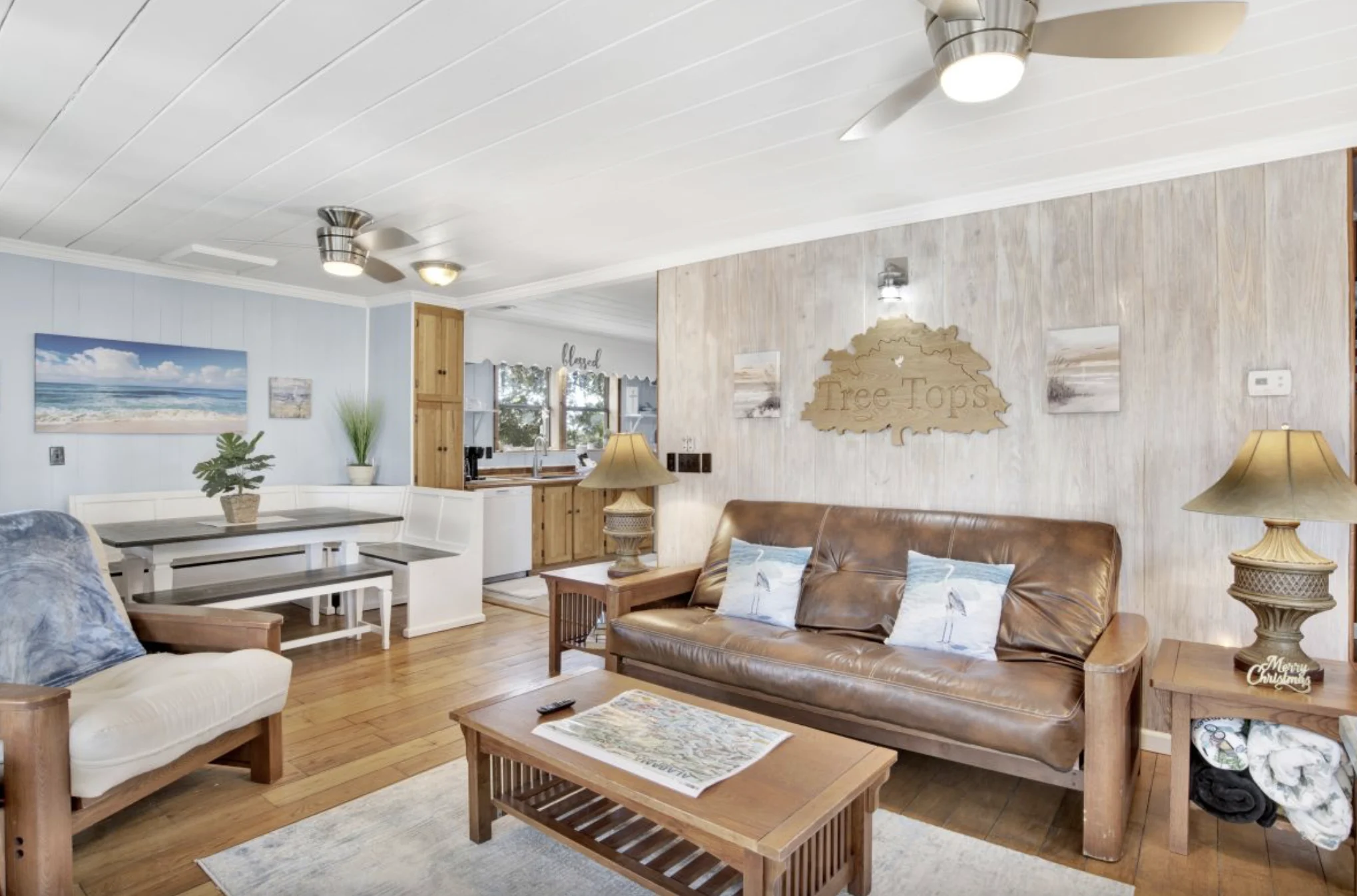 Living room with leather sofa and coffee table, Tree Tops