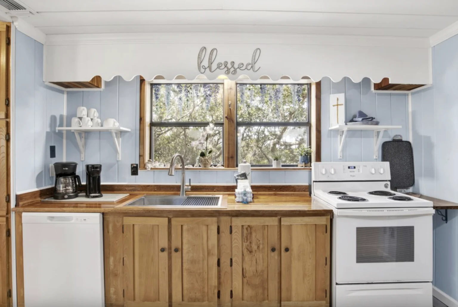 Kitchen sink under tree-view windows, Tree Tops
