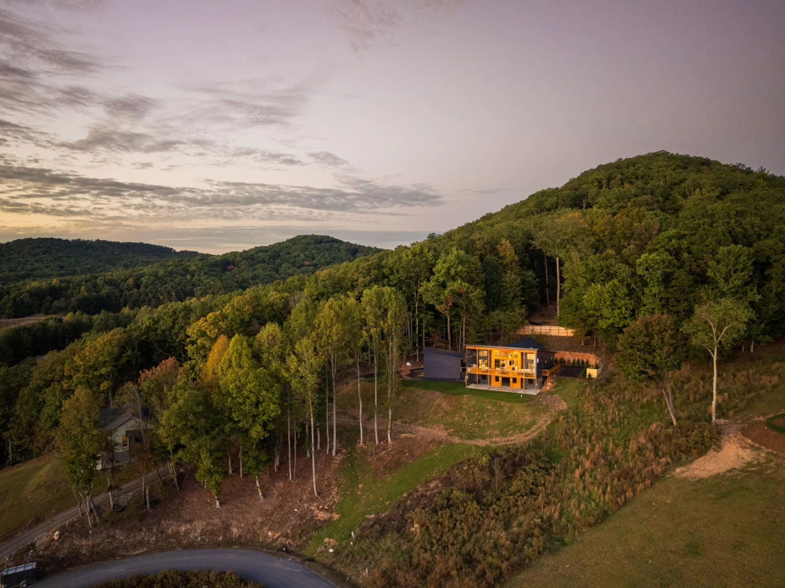 Home on the wooded mountainside at dusk, from above, View Finder II