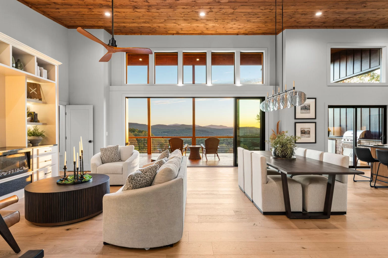 Great room and dining table under the wood ceiling at sunset, View Finder II