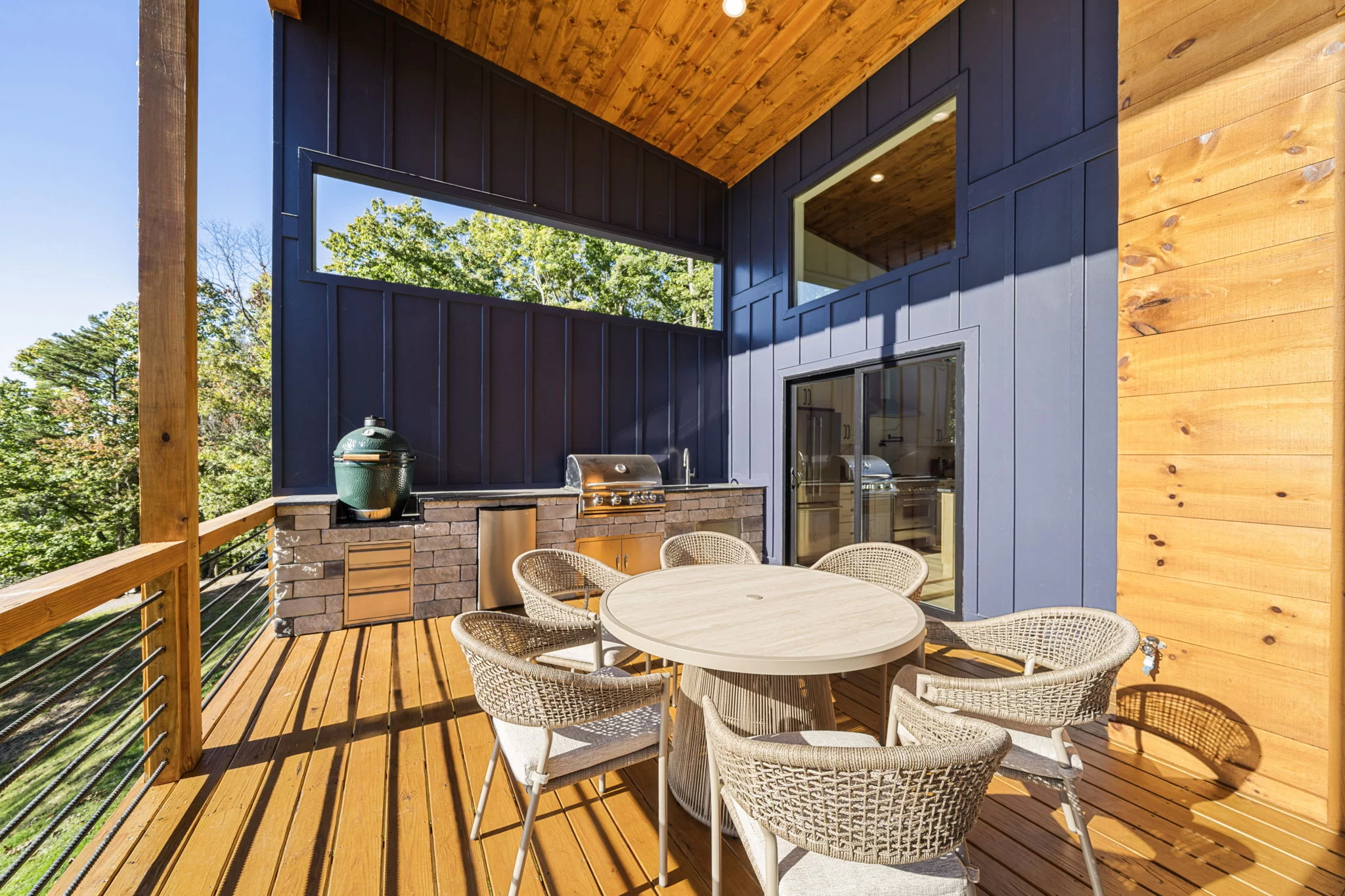 Outdoor dining table and grill on the covered deck, View Finder II
