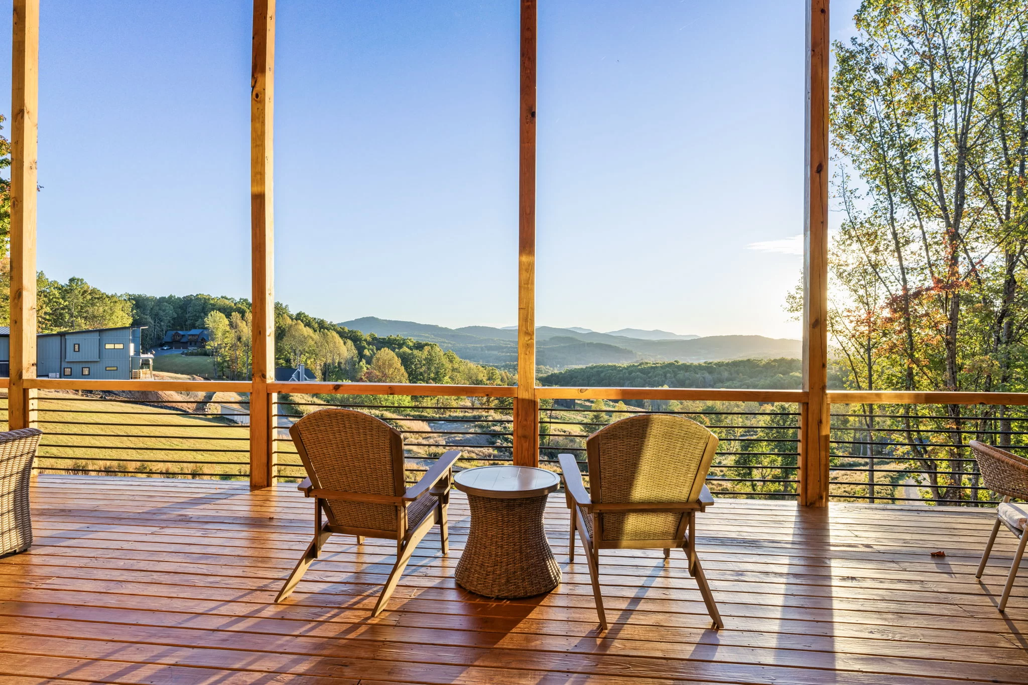 Adirondack chairs on the deck facing the mountains, View Finder II